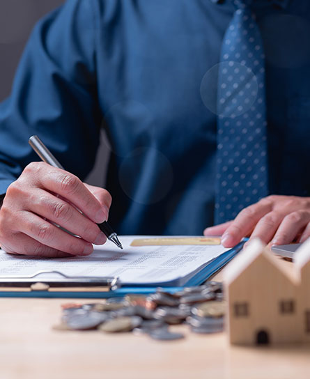 Estate planning lawyer reviewing legal documents for probate case