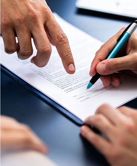 Attorney reviewing estate planning documents for will preparation