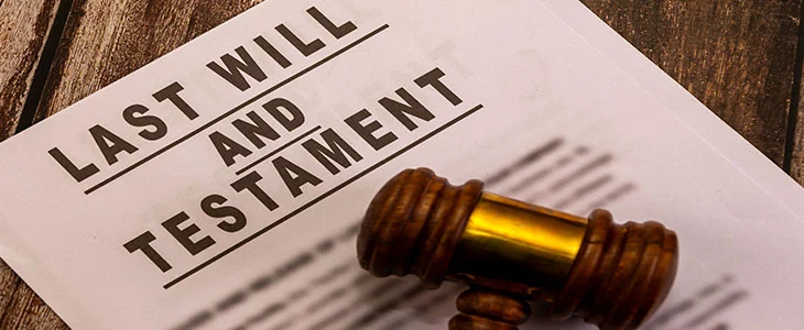 Legal document and gavel on wooden background. Estate planning, inheritance, and probate law concept.